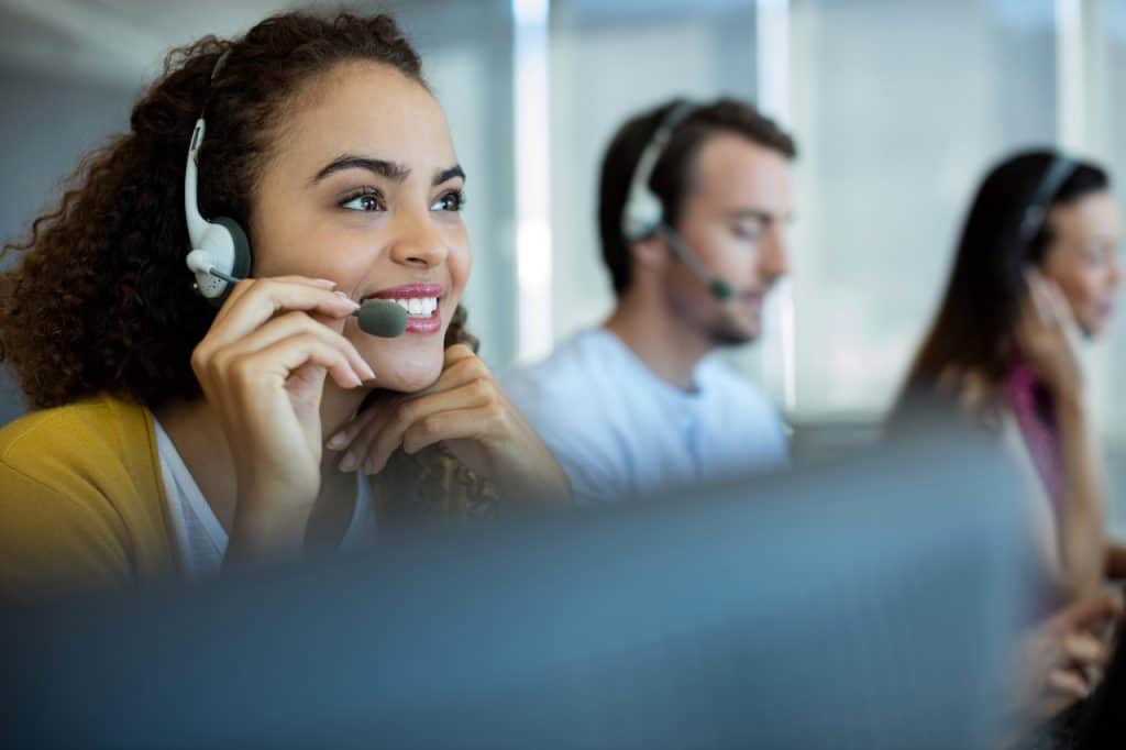 Customer service executive speaking on the phone